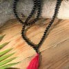 Offbeat Black Onyx Buddhist Mala Beads Necklace With Red Tassels Jewelry