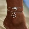 One Tribe Apparel Silver Stacked Om & Wave Charm Boho Anklet