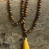 Offbeat Tiger Eye Buddhist Mala Beads Necklace With Yellow Tassels Jewelry